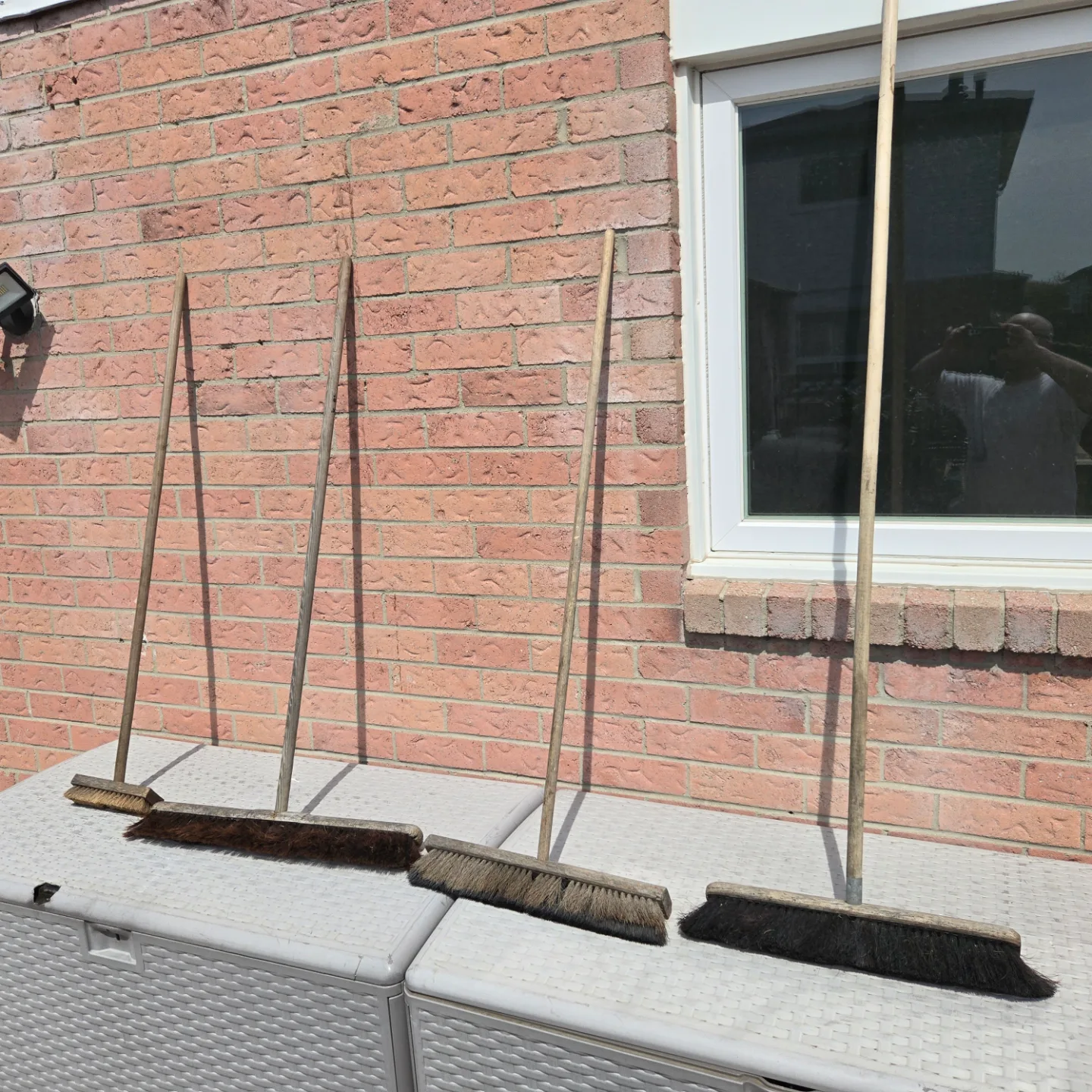 Four Vintage Wooden-Handled Brooms thumbnail