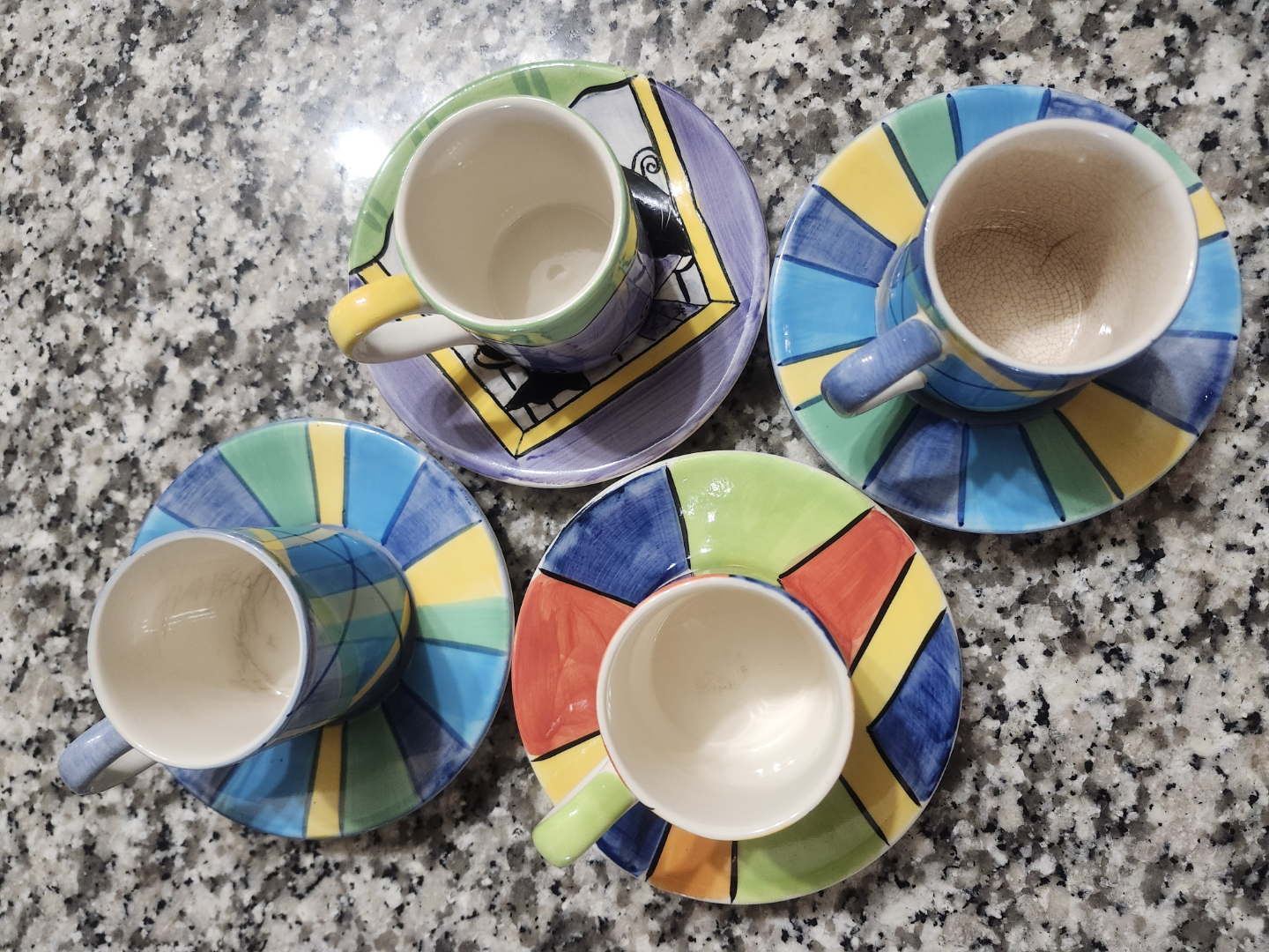 Set of Four Hand-Painted Espresso Cups and Saucers