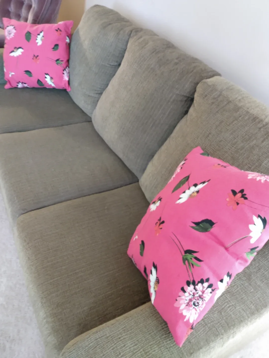 Three-seater Sofa with Pink Floral Pillows thumbnail