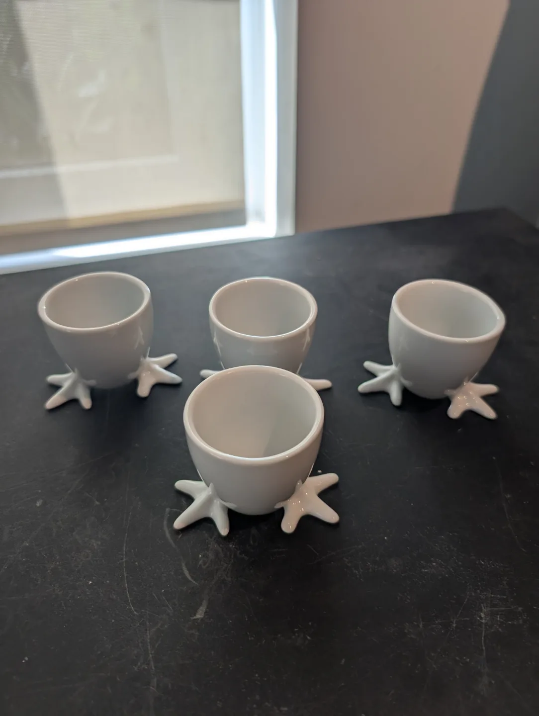Set of four ceramic egg cups thumbnail