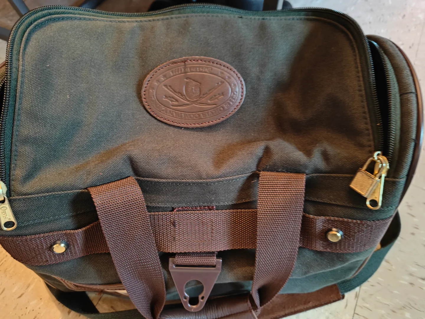 Orvis company Vintage Green Canvas & Leather Duffel Bag image indicator(3)