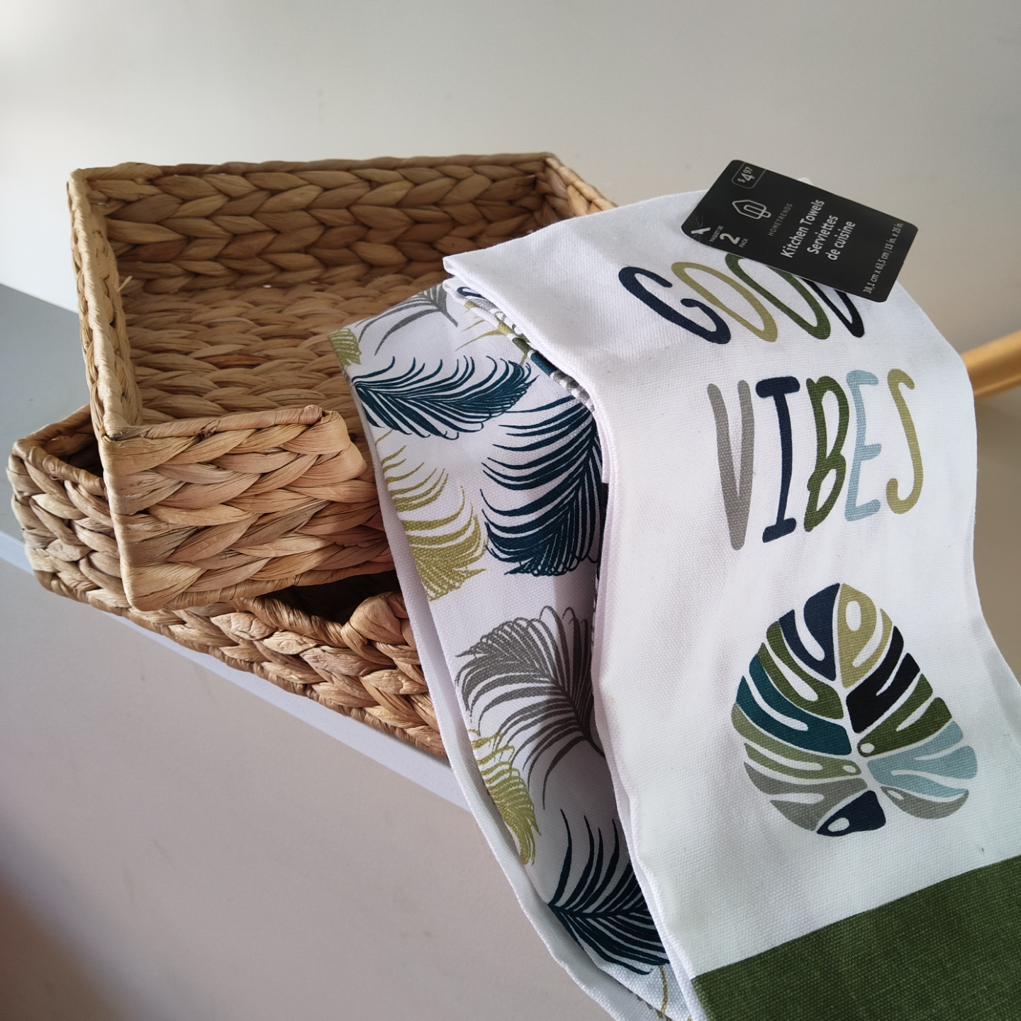 Set of Two Woven Baskets with Kitchen Towels