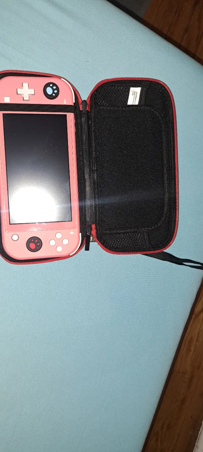 Pink Nintendo Switch Lite with Case thumbnail