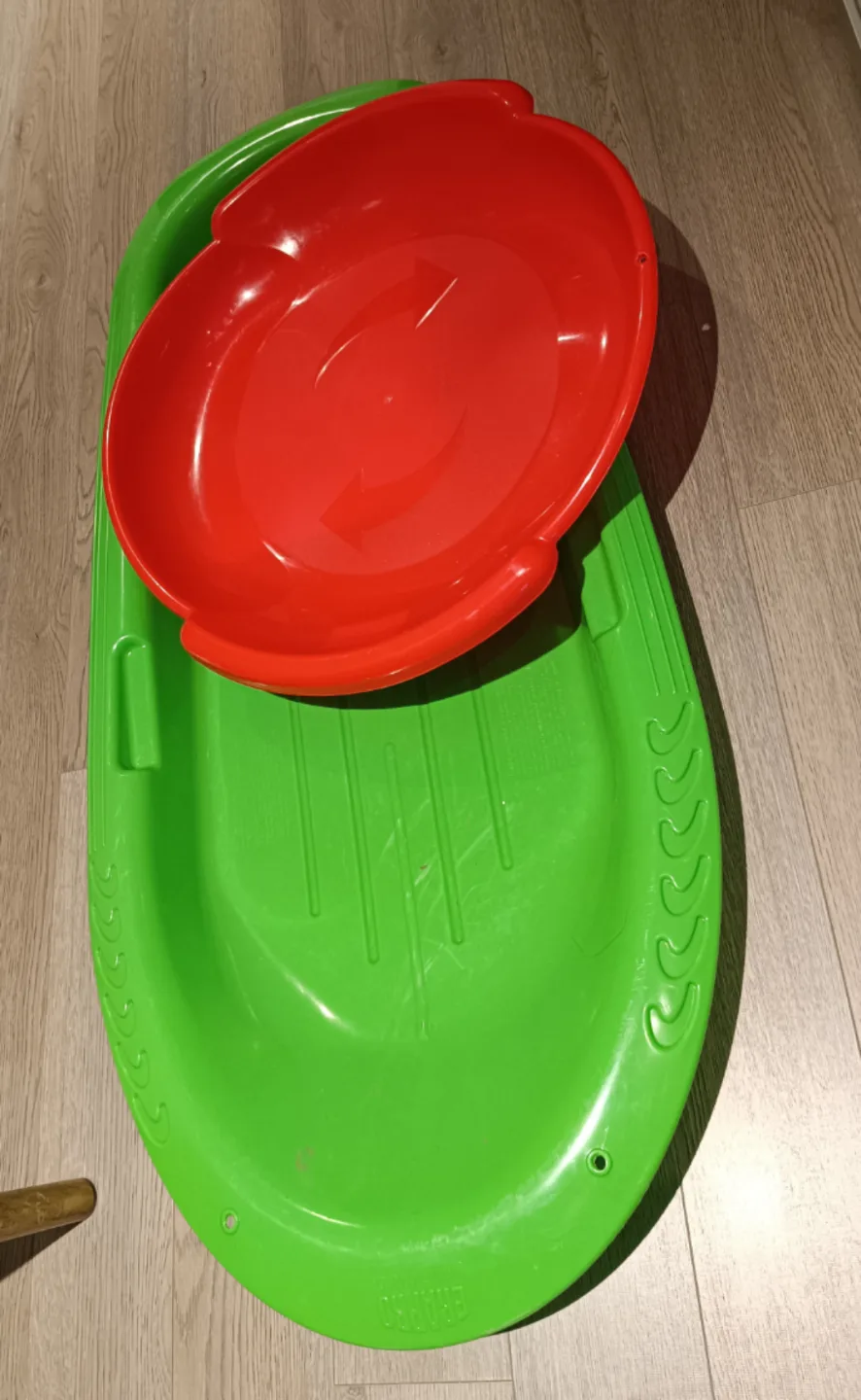 FREE - Two Plastic Sleds - Red and Green thumbnail