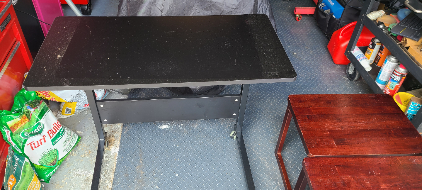 Black rolling computer desk