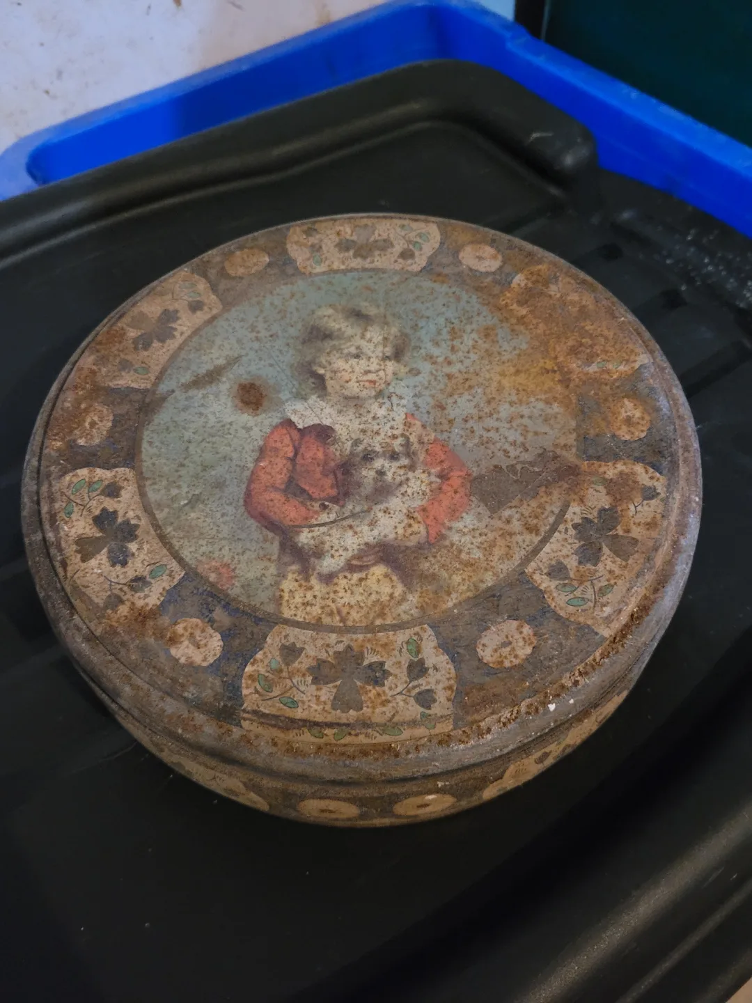 Antique Round Tin Box with Child Image thumbnail