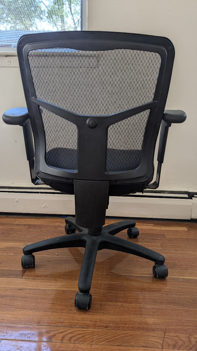 Ergonomic revolving office chair