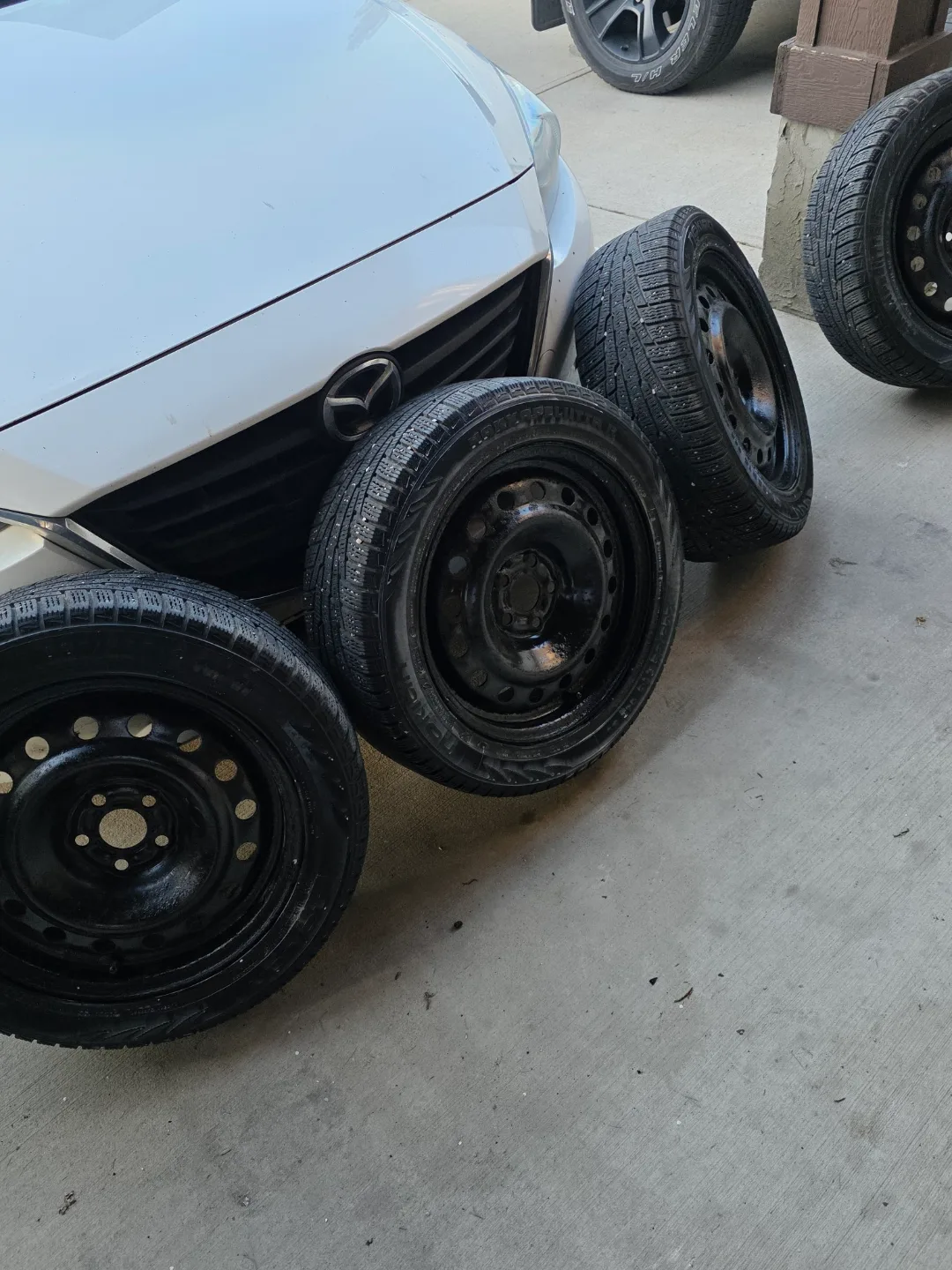 Four Used Nokian Hakkapeliitta R2 Winter Tires on Steel Rims image indicator(2)