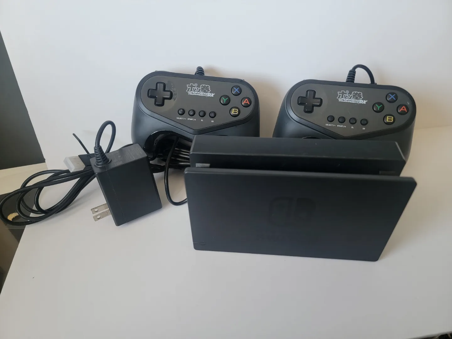 Nintendo Switch Dock with 2 Poken Controllers & Power Supply thumbnail