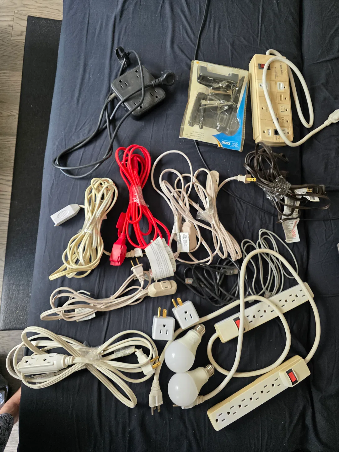 Bulk Lot of Electrical Cords, Power Bars, and Light Bulbs thumbnail