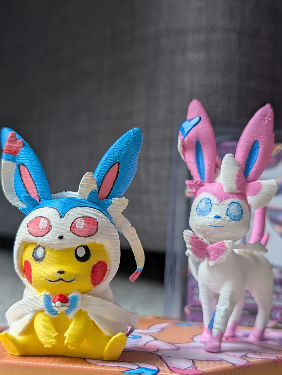 Sylveon card with hand painted PSA slaps and figurines image indicator(5)