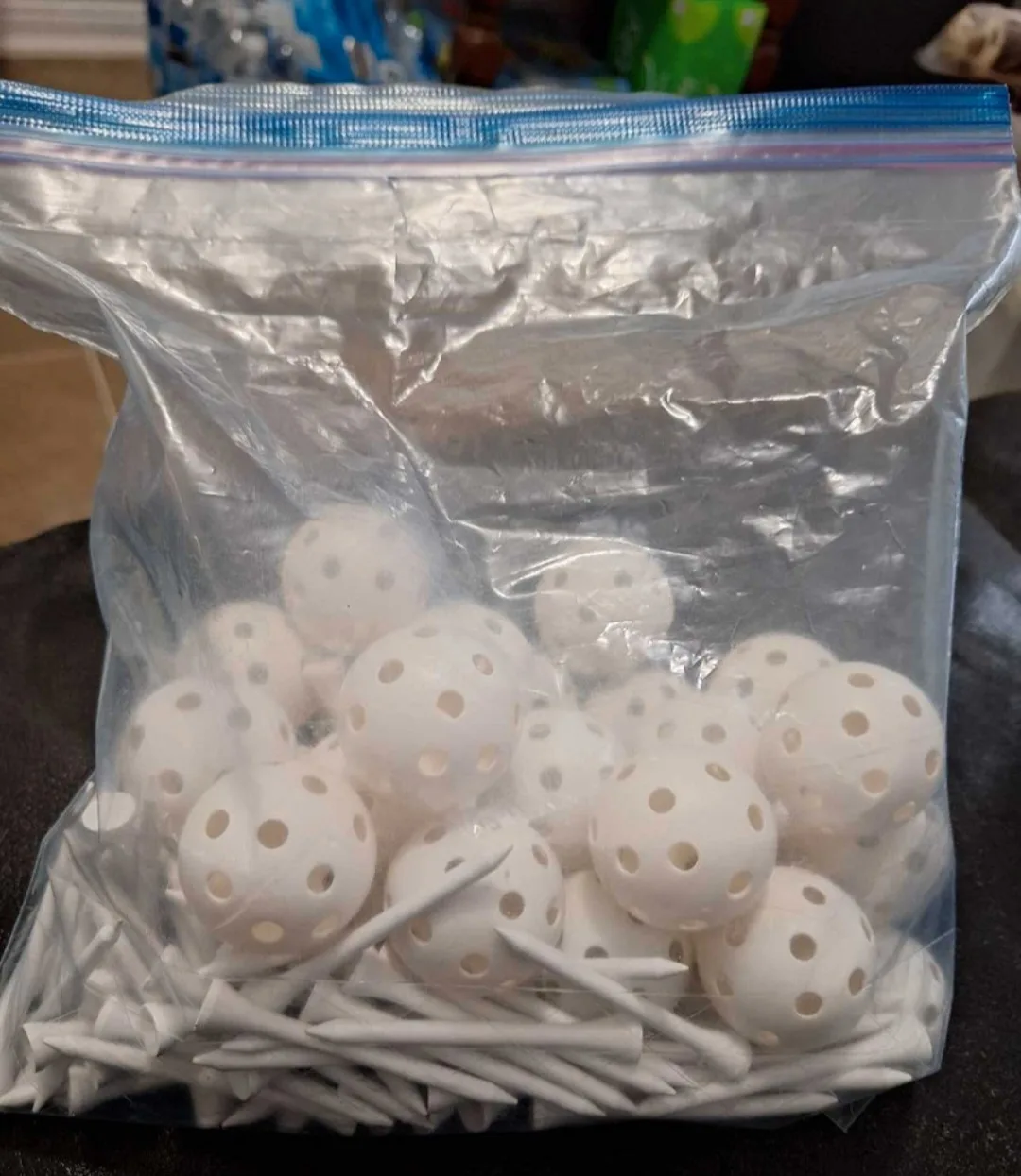 24 White Plastic Golf Balls with 89 Tees thumbnail