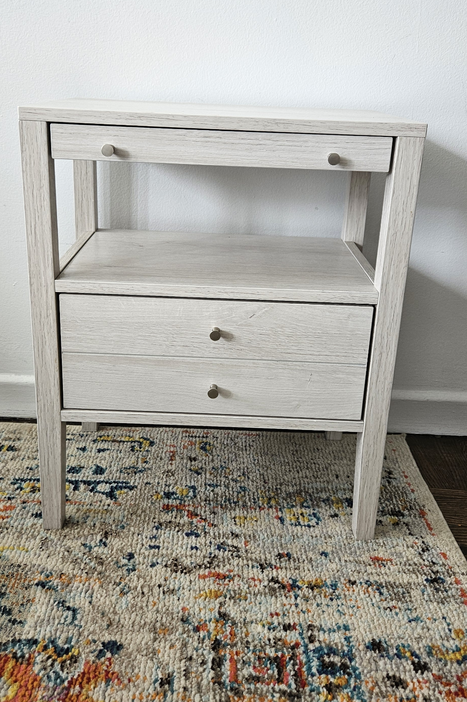 White Wooden Nightstand with Drawers and Shelves