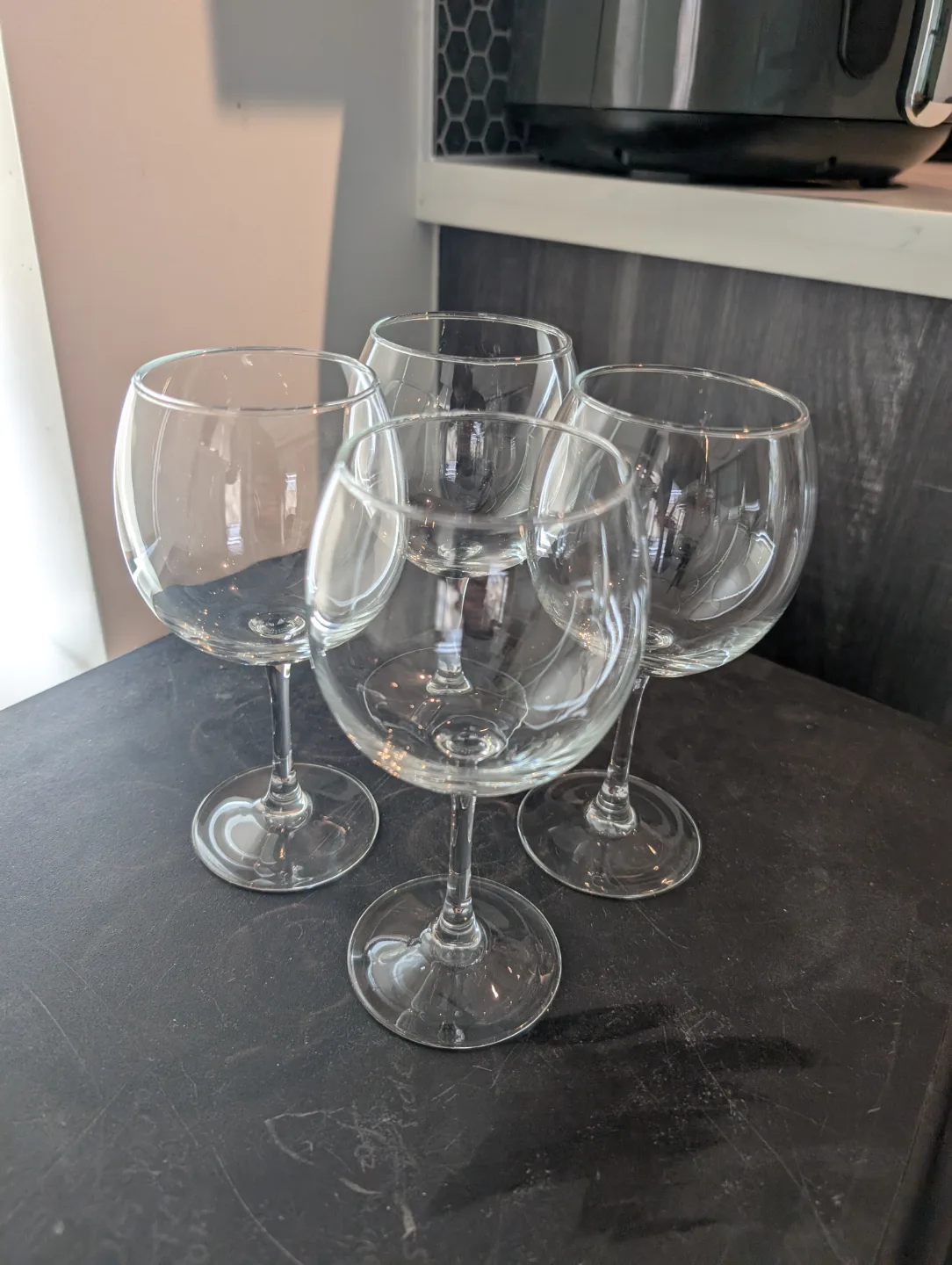 Set of four clear glass wine glasses thumbnail
