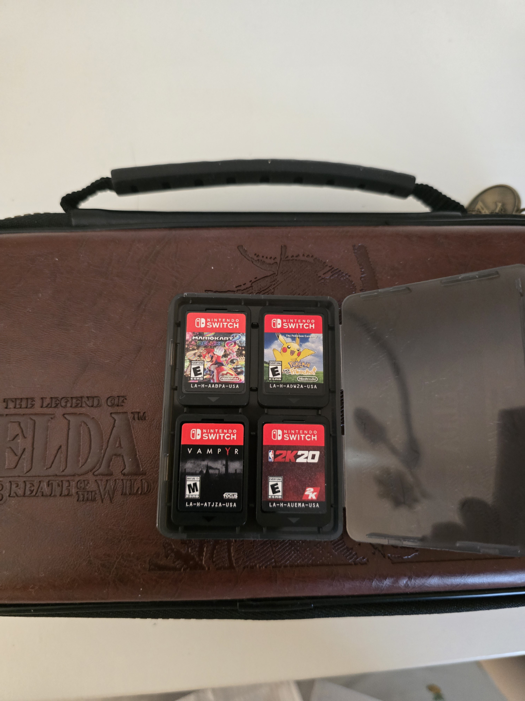 Nintendo Switch with Breath of the Wild Case and Four Games - photo 3