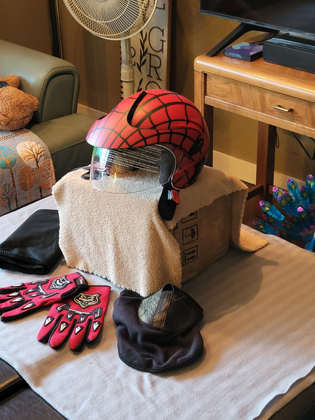 Spider-Man themed motorcycle helmet, gloves, and balaclava