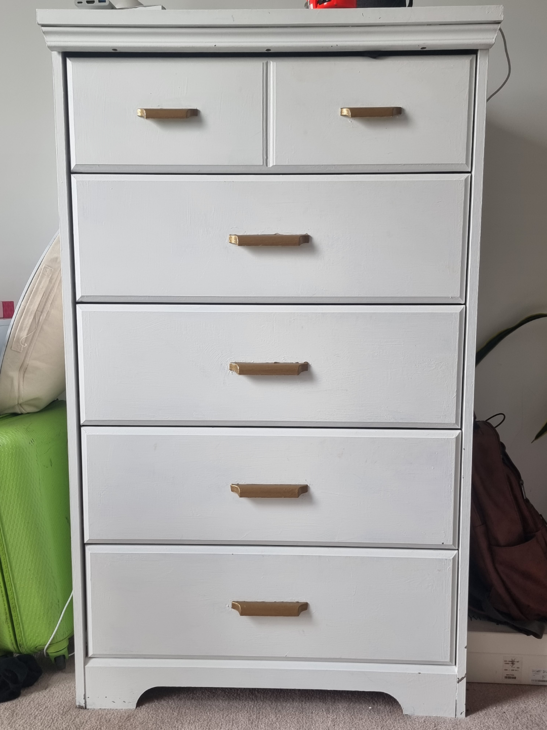 White dresser with gold handles