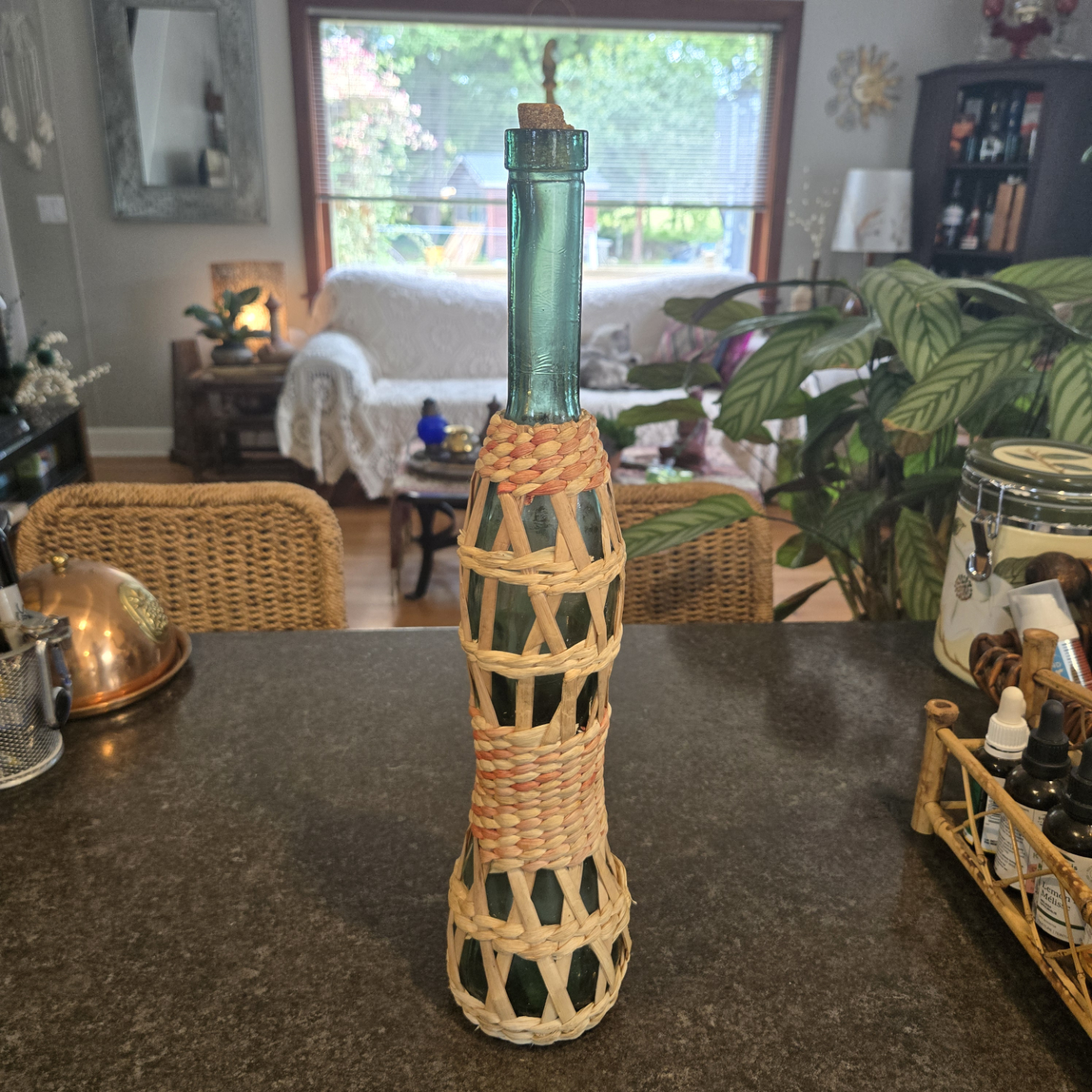 Vintage Boho Glass Bottle with Woven Basket Cover