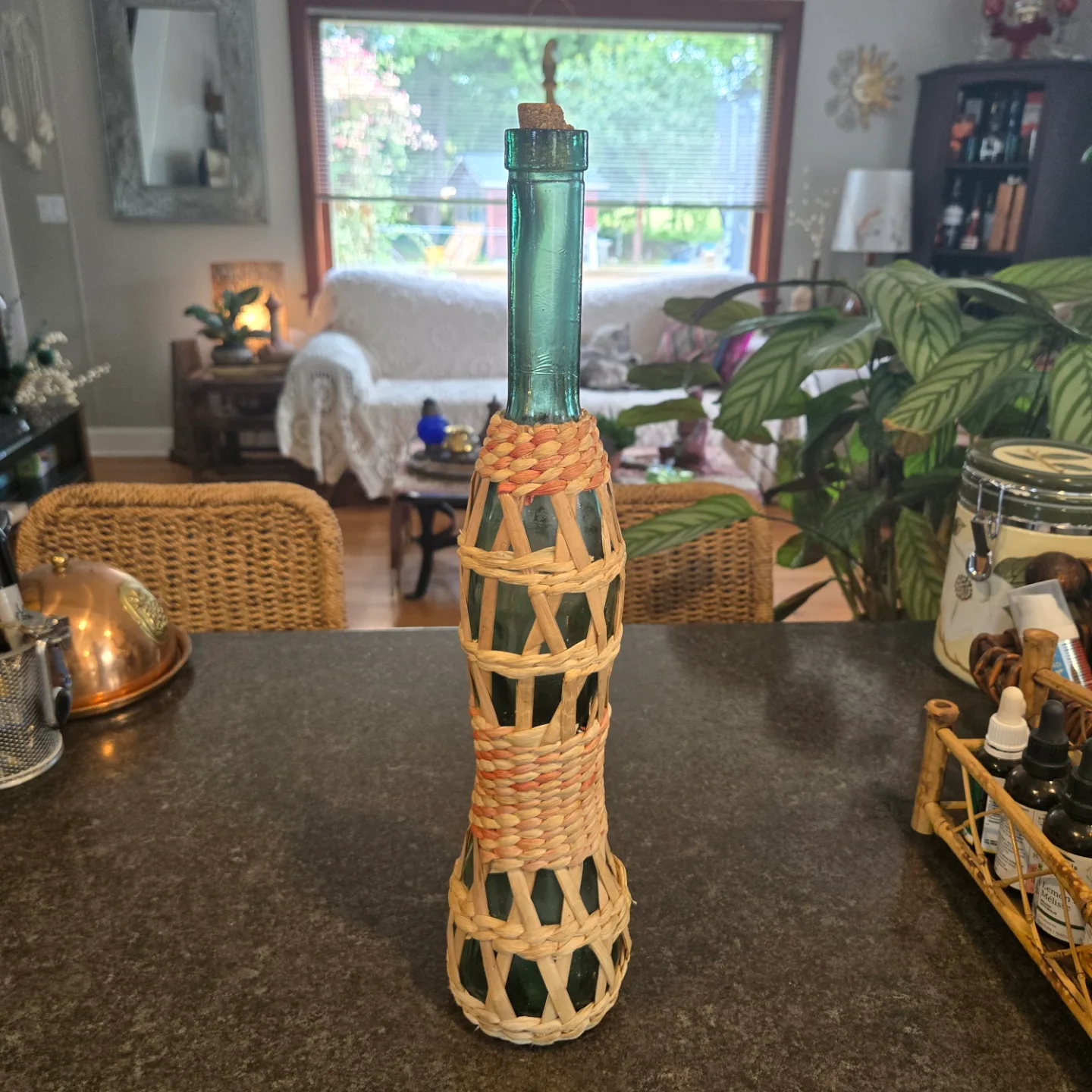 Vintage Boho Glass Bottle with Woven Basket Cover thumbnail