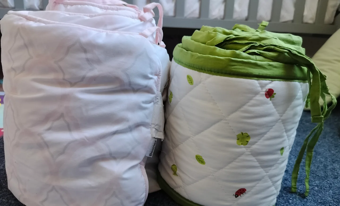Two crib bumpers, pink and green image indicator(3)