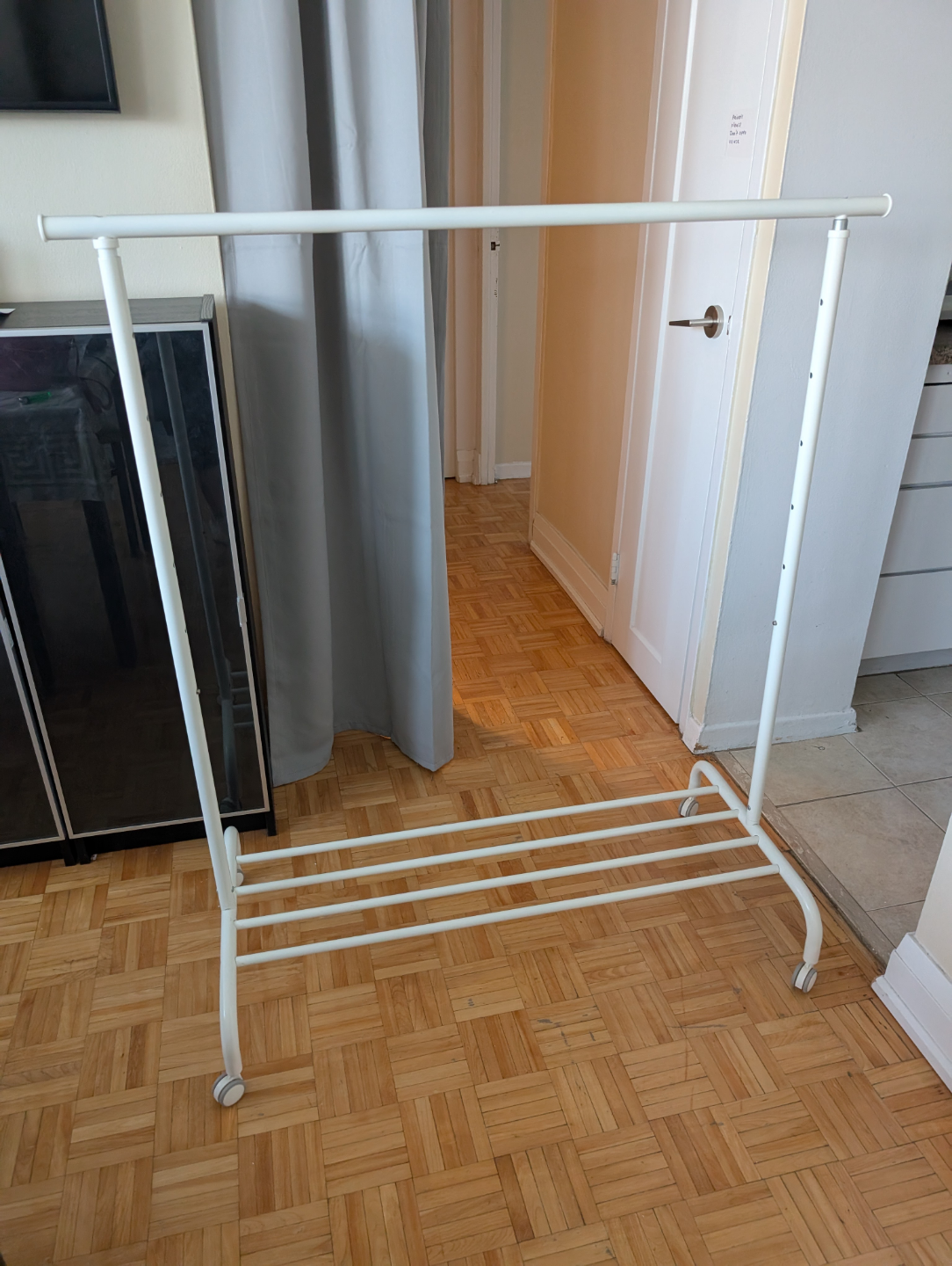 White Metal Clothing Rack with Wheels