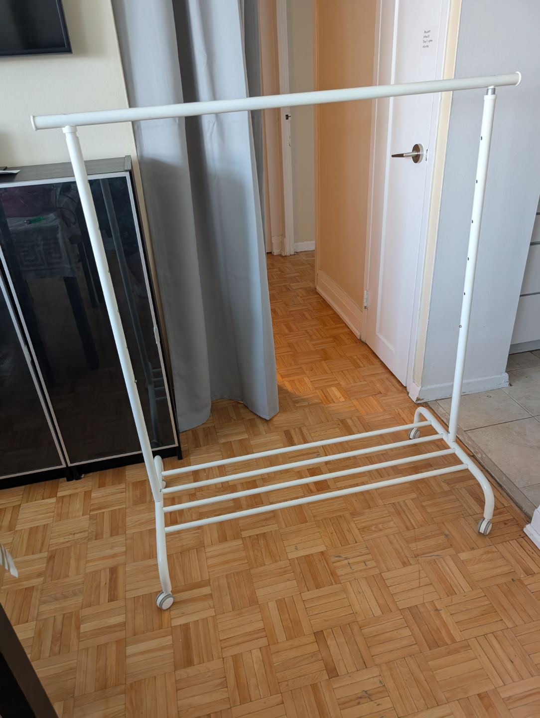 White Metal Clothing Rack with Wheels - photo 2