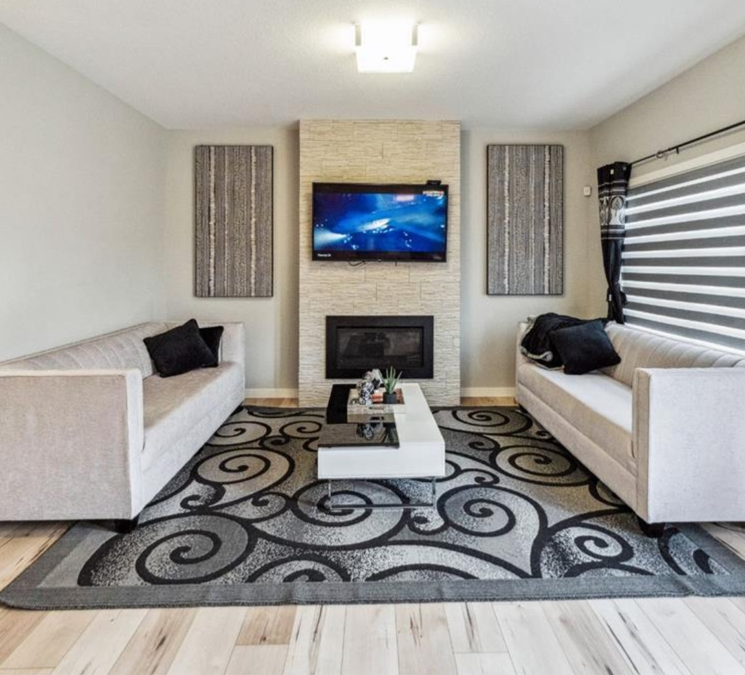 Modern Living Room Set: Two Sofas, Coffee Table, Rug