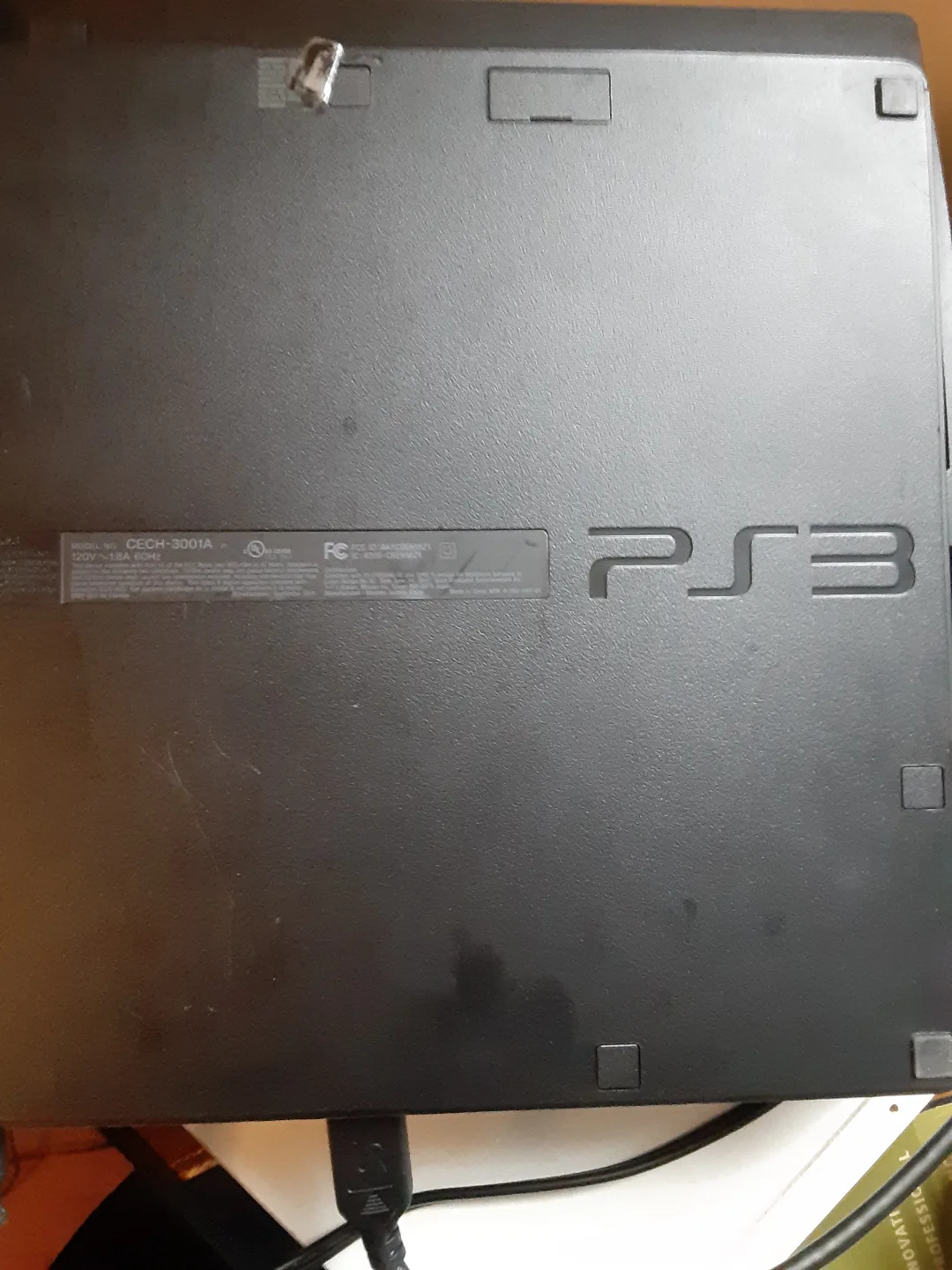 PlayStation 3 Console with Two Controllers and Game thumbnail