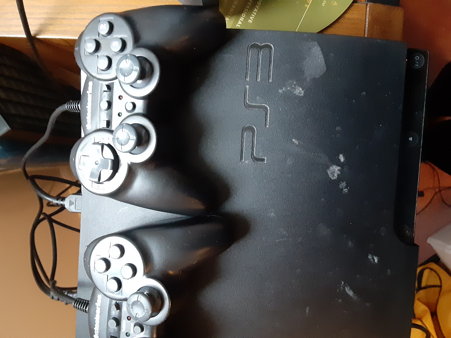 PlayStation 3 Console with Two Controllers and Game - photo 2