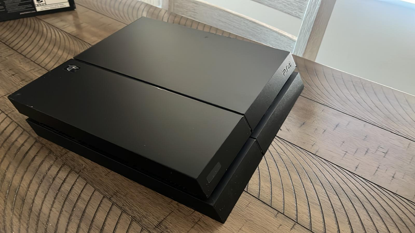 PlayStation 4 with two controllers - photo 2