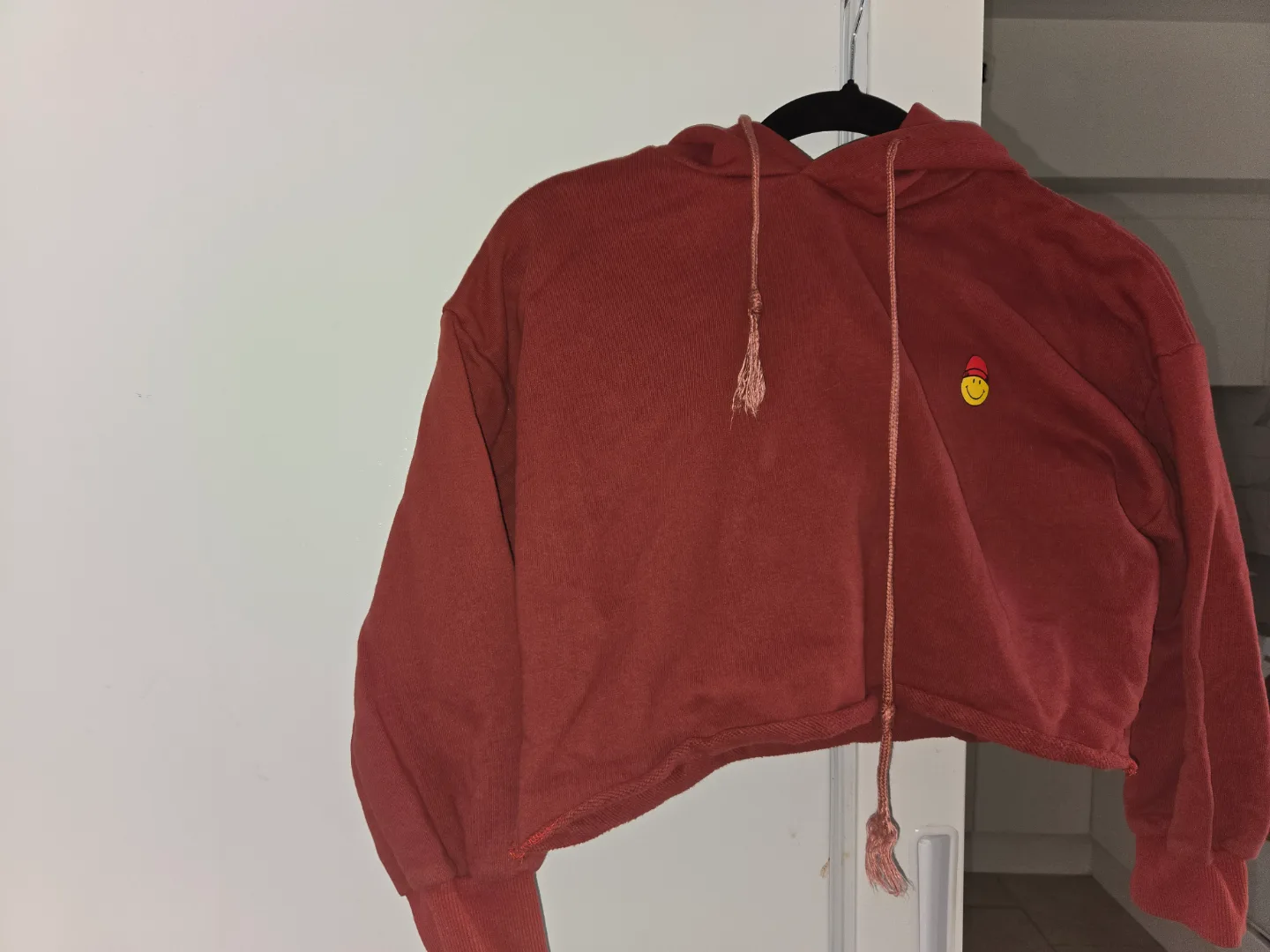 Red cropped hoodie with smiley face. thumbnail
