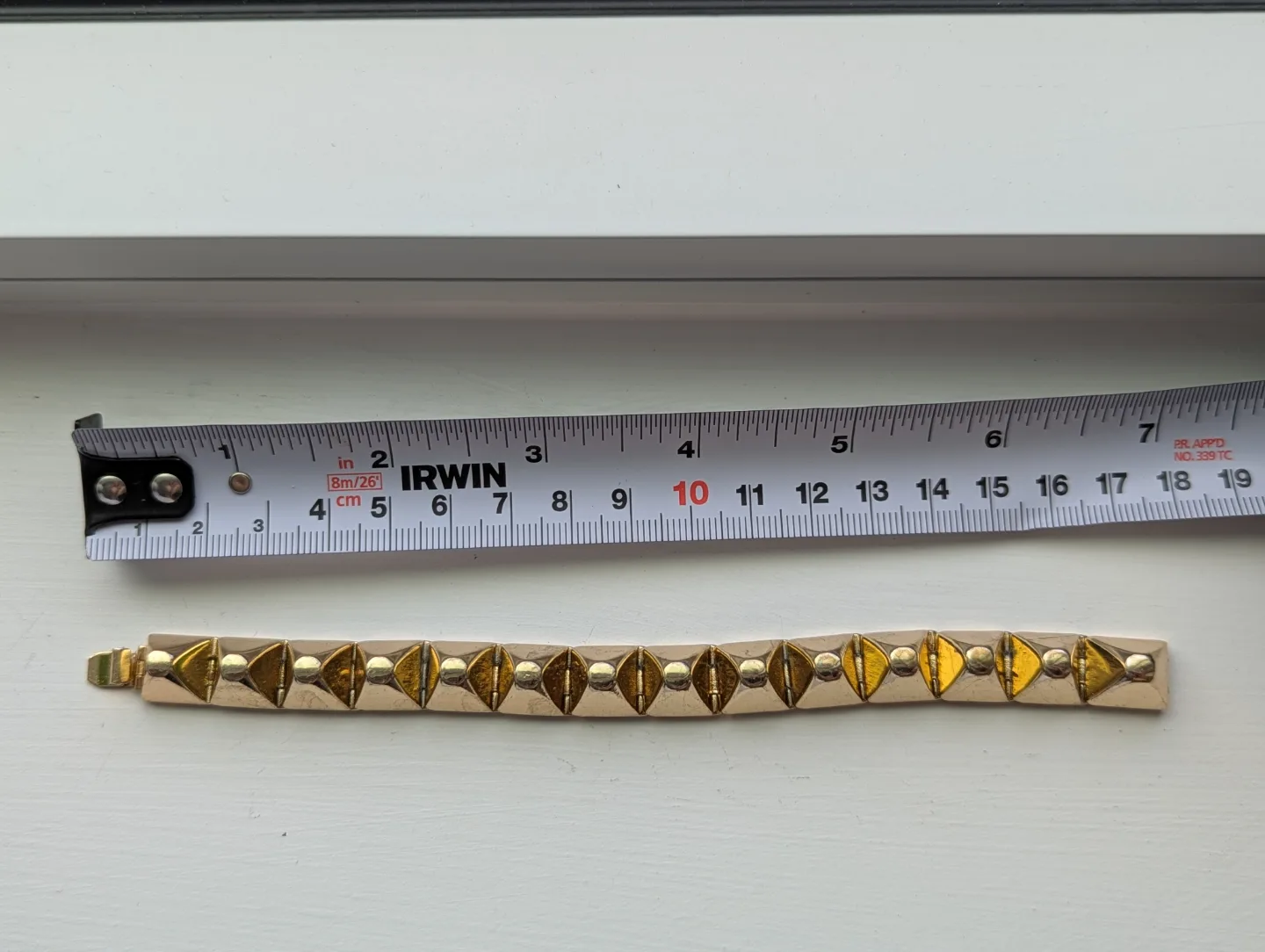 Gold-toned Triangular Spike Bracelet BR image indicator(6)