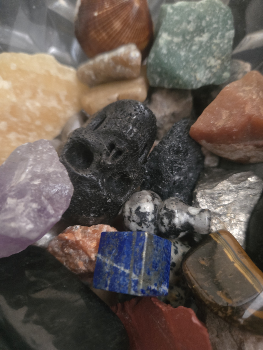 Collection of tumbled stones and crystals