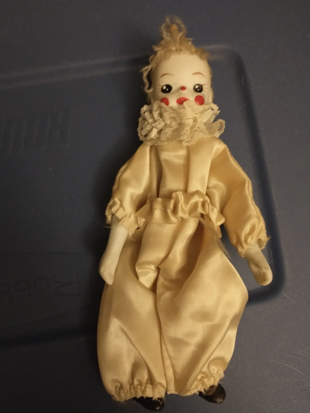 VINTAGE PORCELAIN CLOWN DOLL IN A CREAM SATIN COSTUME thumbnail