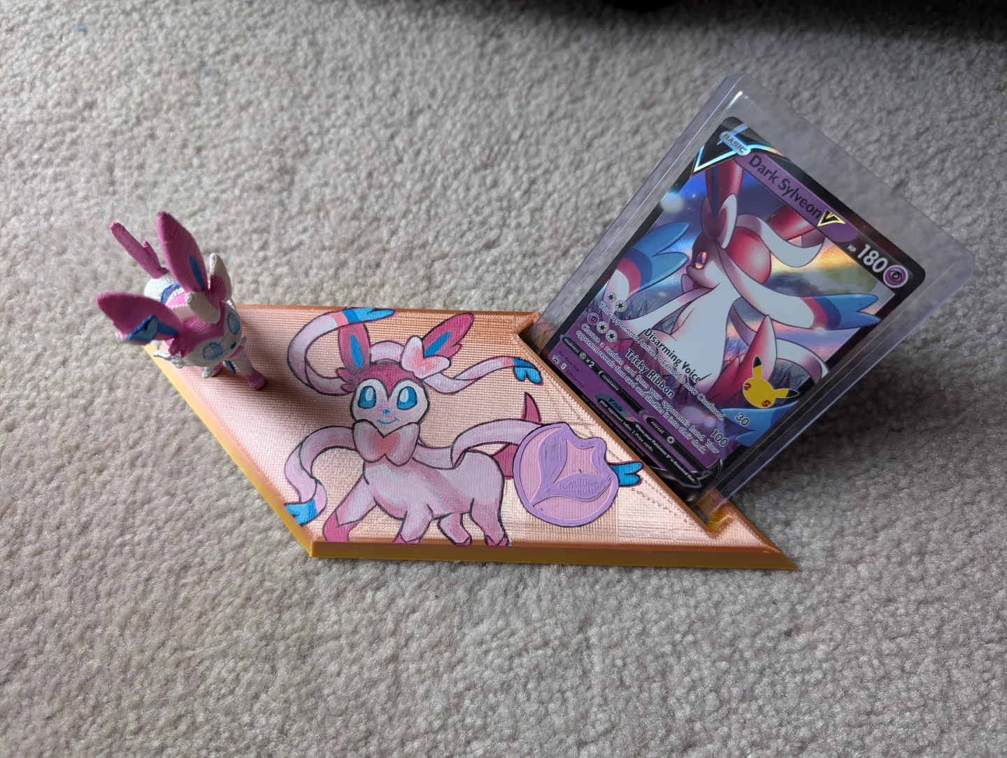Sylveon card with hand painted PSA slaps and figurines image indicator(2)