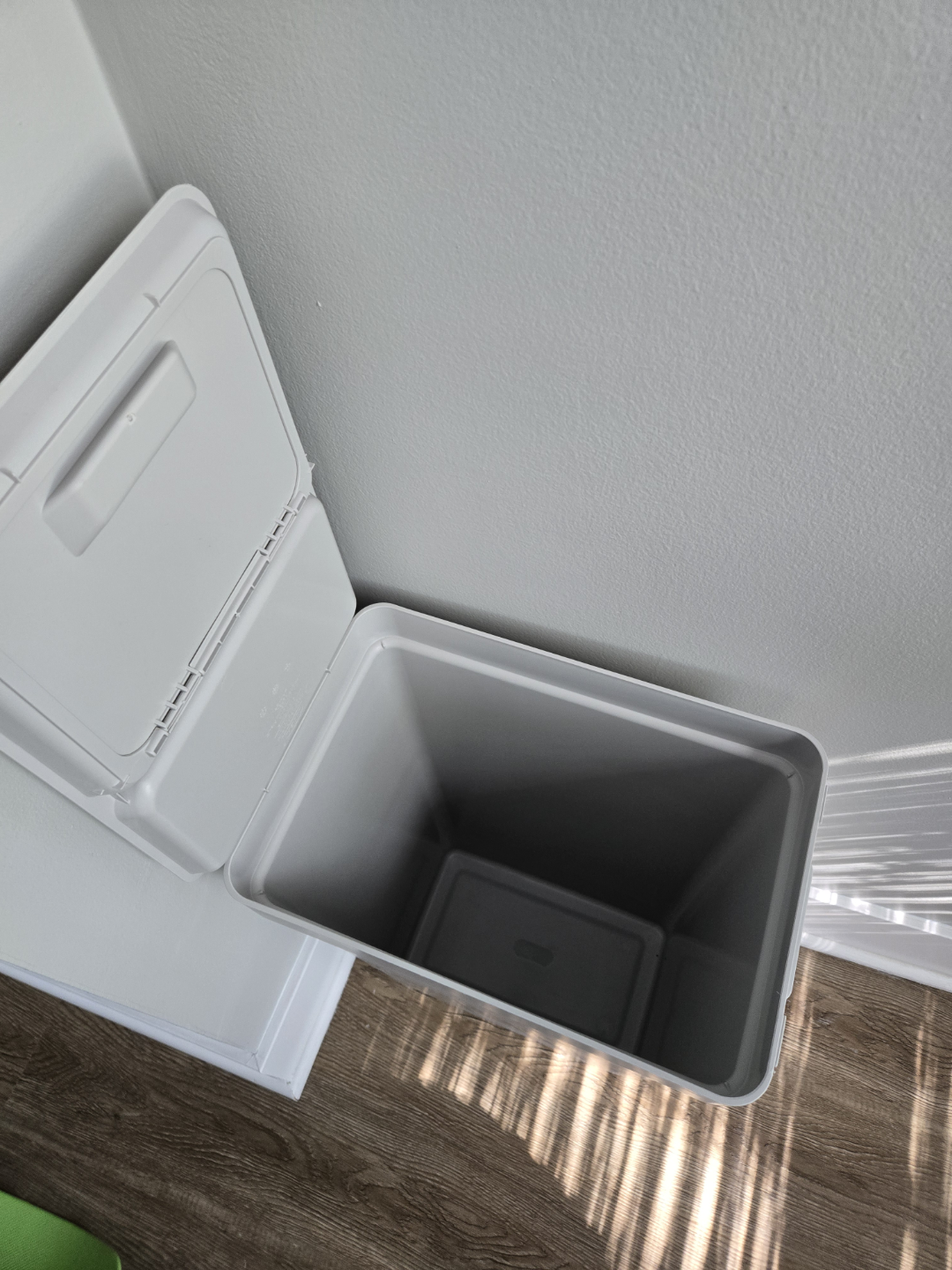 White Plastic Trash Can