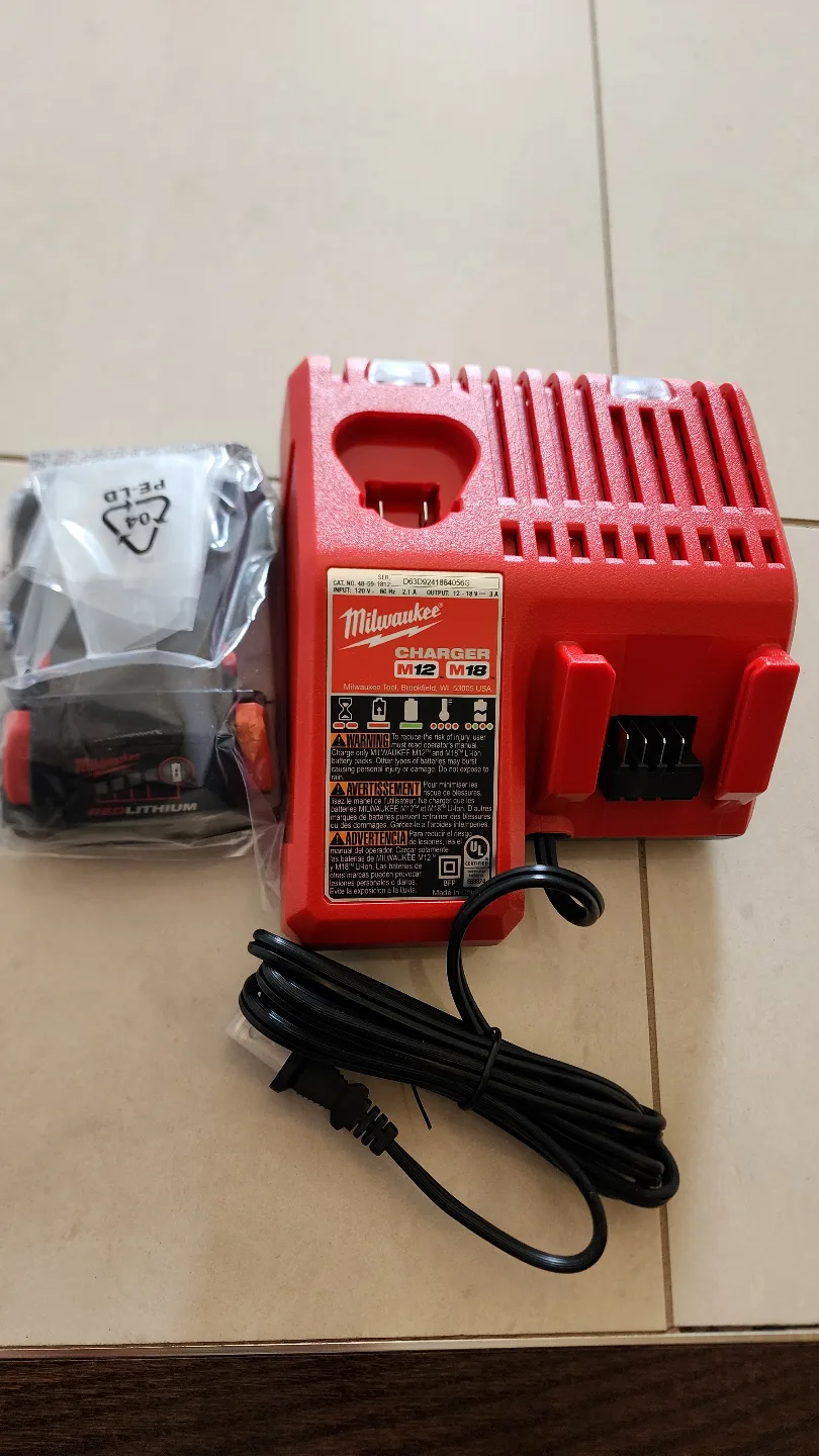 Authentic Brand New Milwaukee 2.0Ah Battery & M12/M18 Charger image indicator(2)