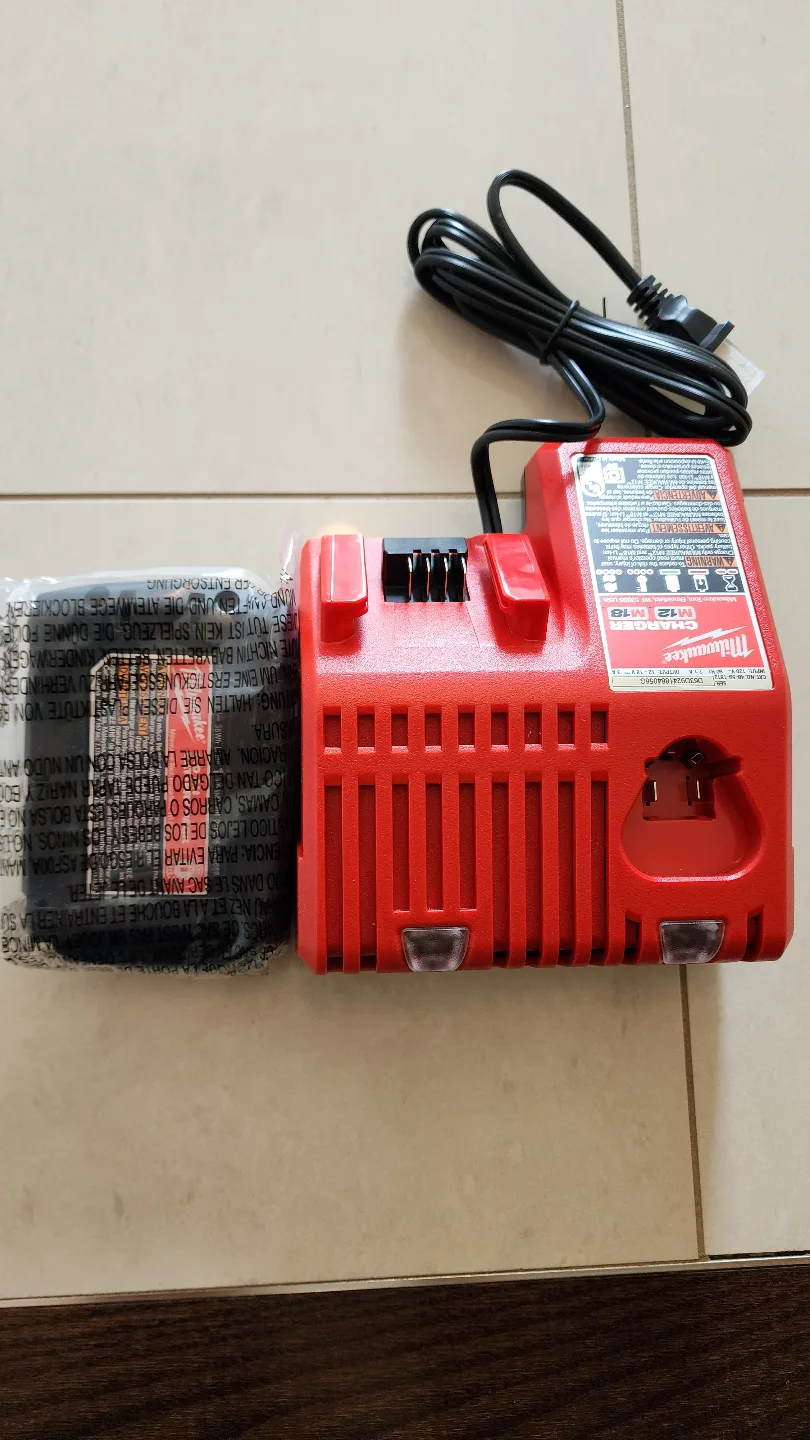 Authentic Brand New Milwaukee 2.0Ah Battery & M12/M18 Charger image indicator(3)