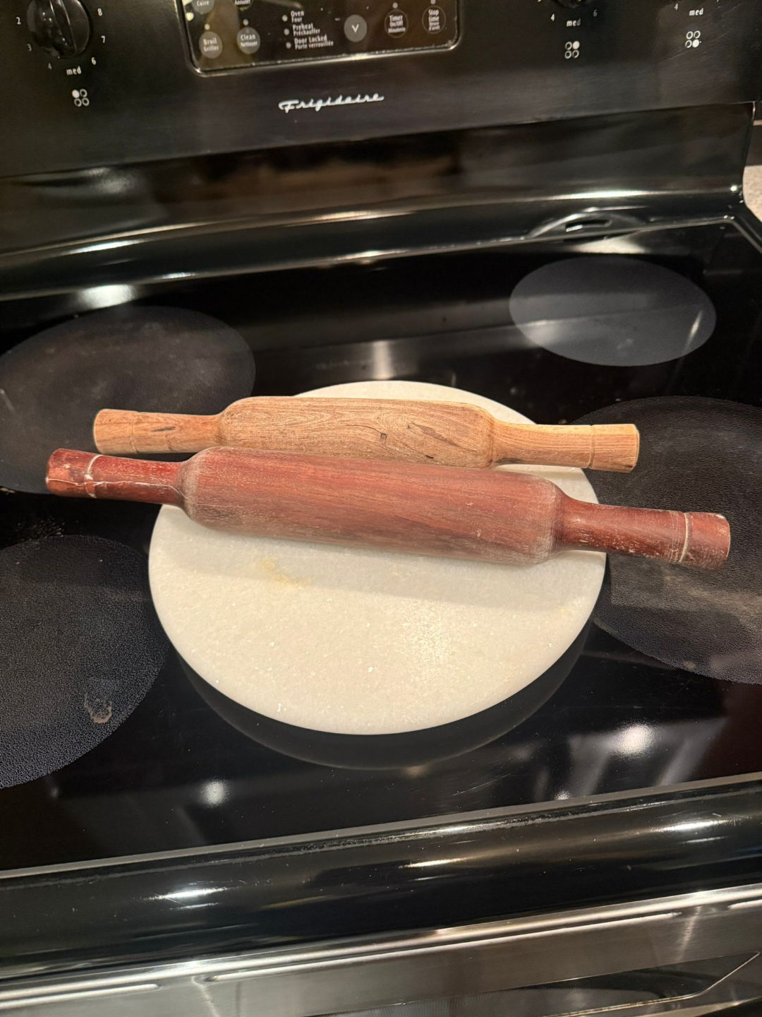 Two Wooden Rolling Pins with Marble Pastry Board