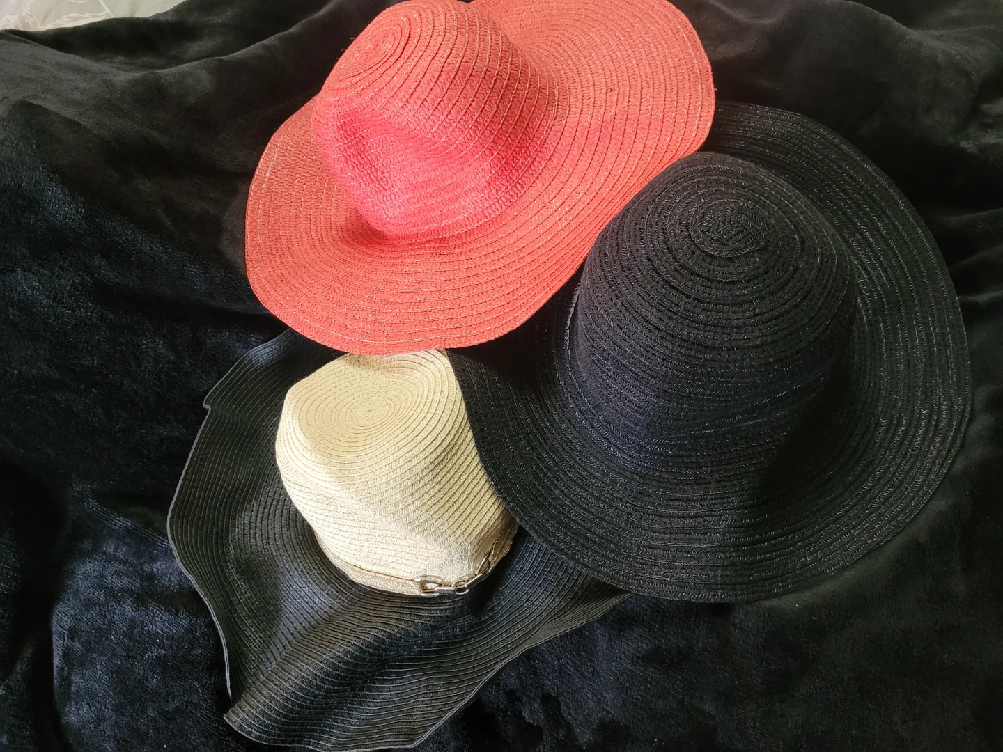 Three sun hats: coral, black, and black/beige thumbnail