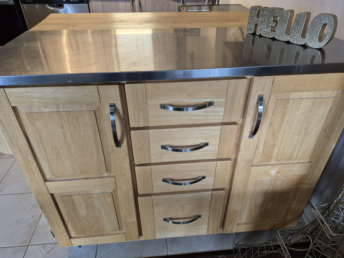 Wood and stainless steel island with stools. - photo 3
