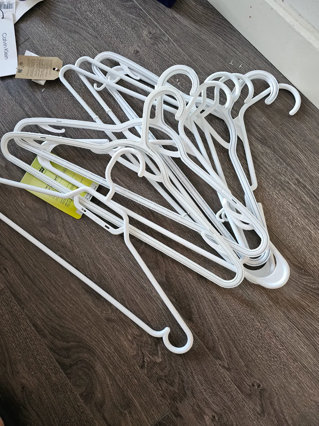 Bulk lot of white plastic hangers thumbnail