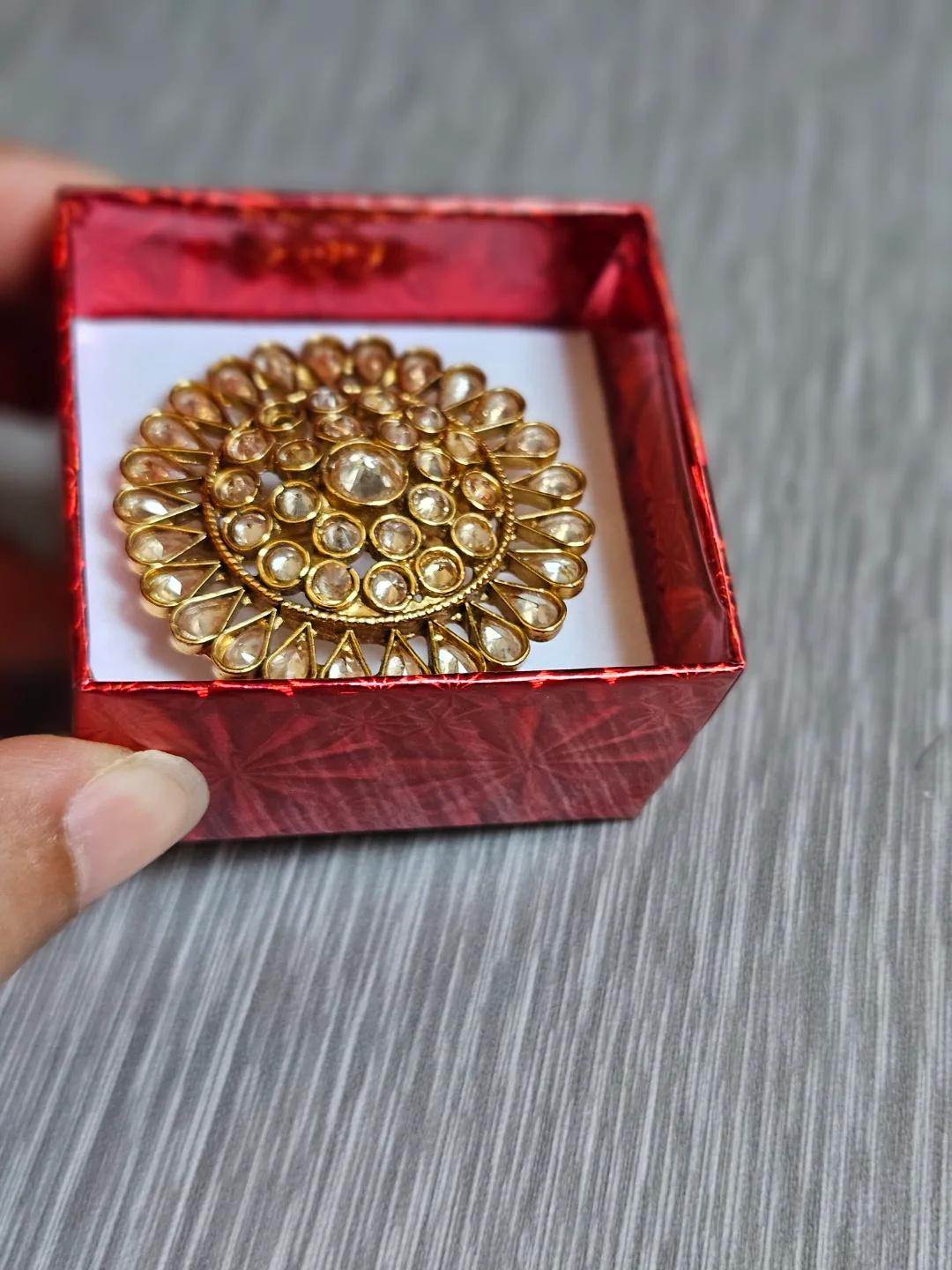 look like Gold Kundan Ring with White Stones image indicator(3)