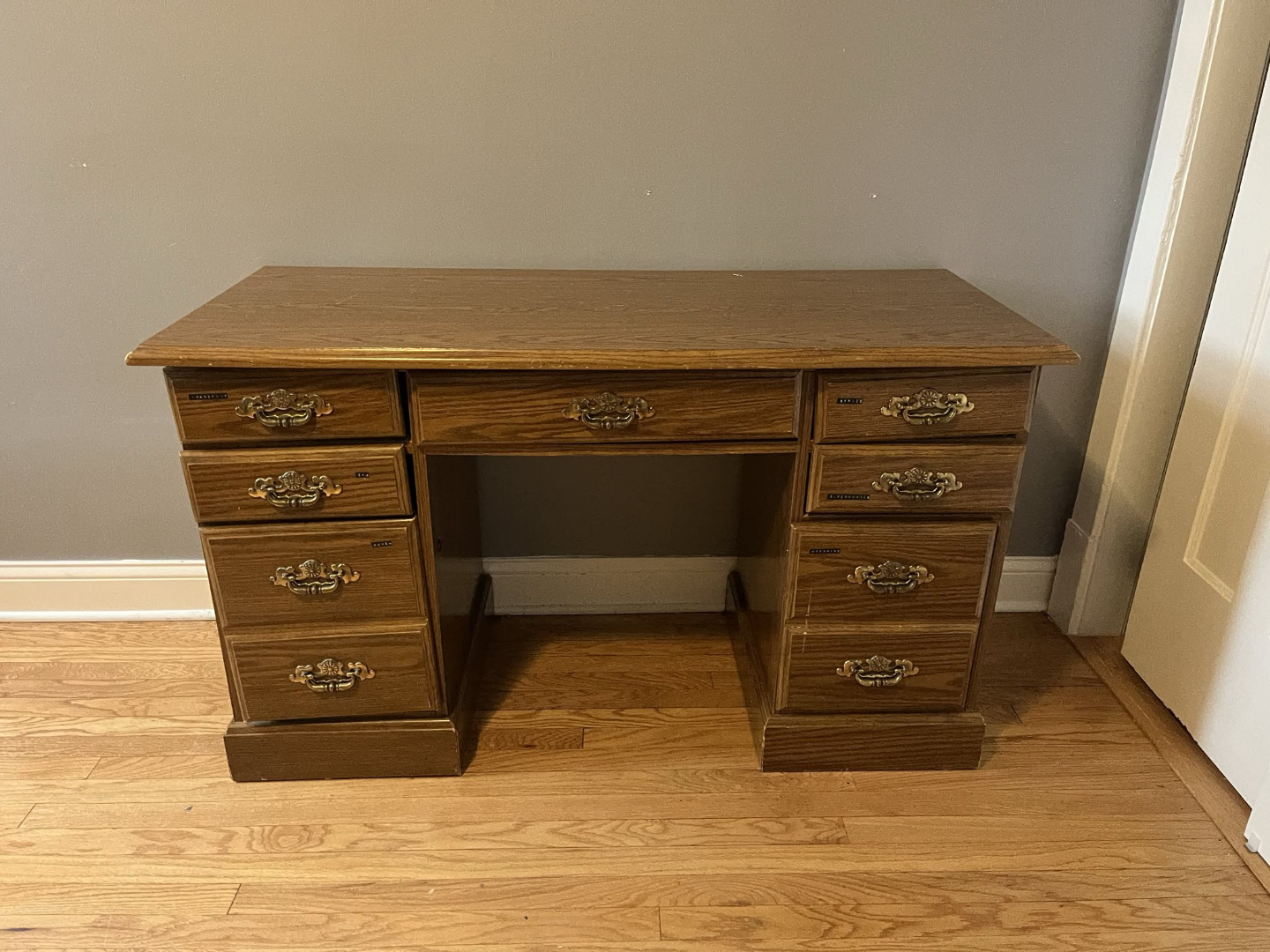 Wood desk with many drawers