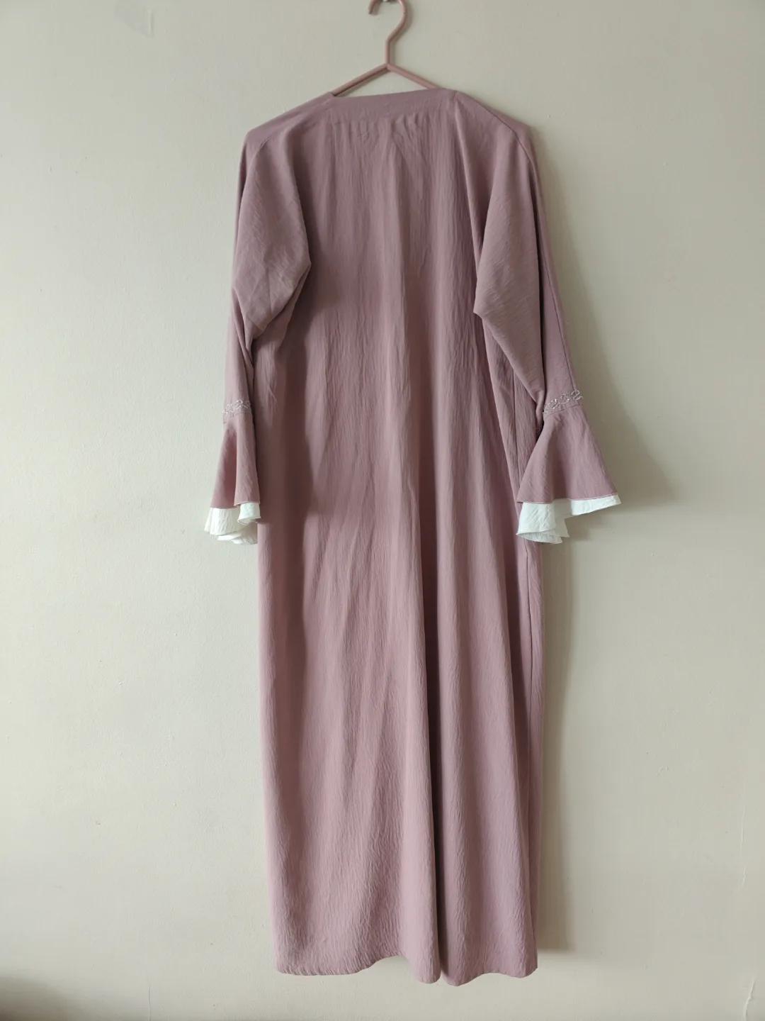 Elegant dusty rose abaya with white trim image indicator(4)
