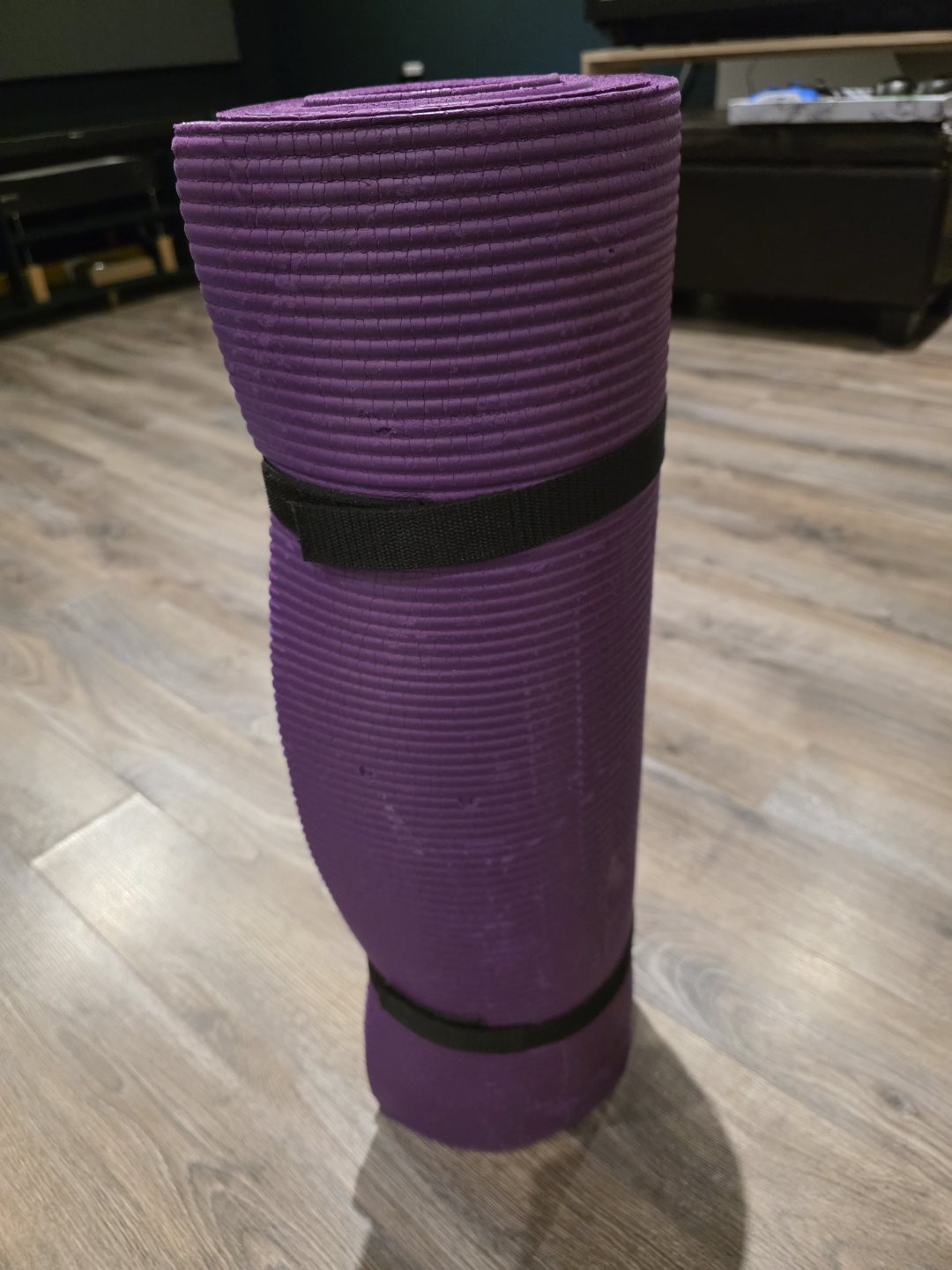 Rolled Purple Yoga Mat