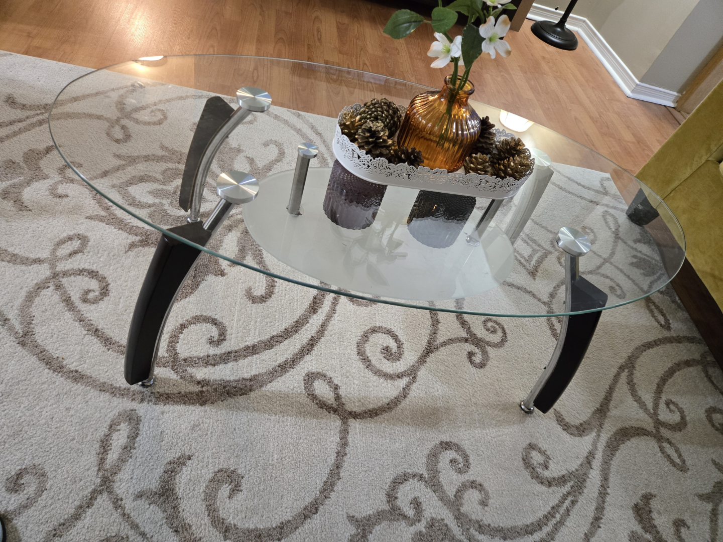 Oval Glass Coffee Table with Black Legs