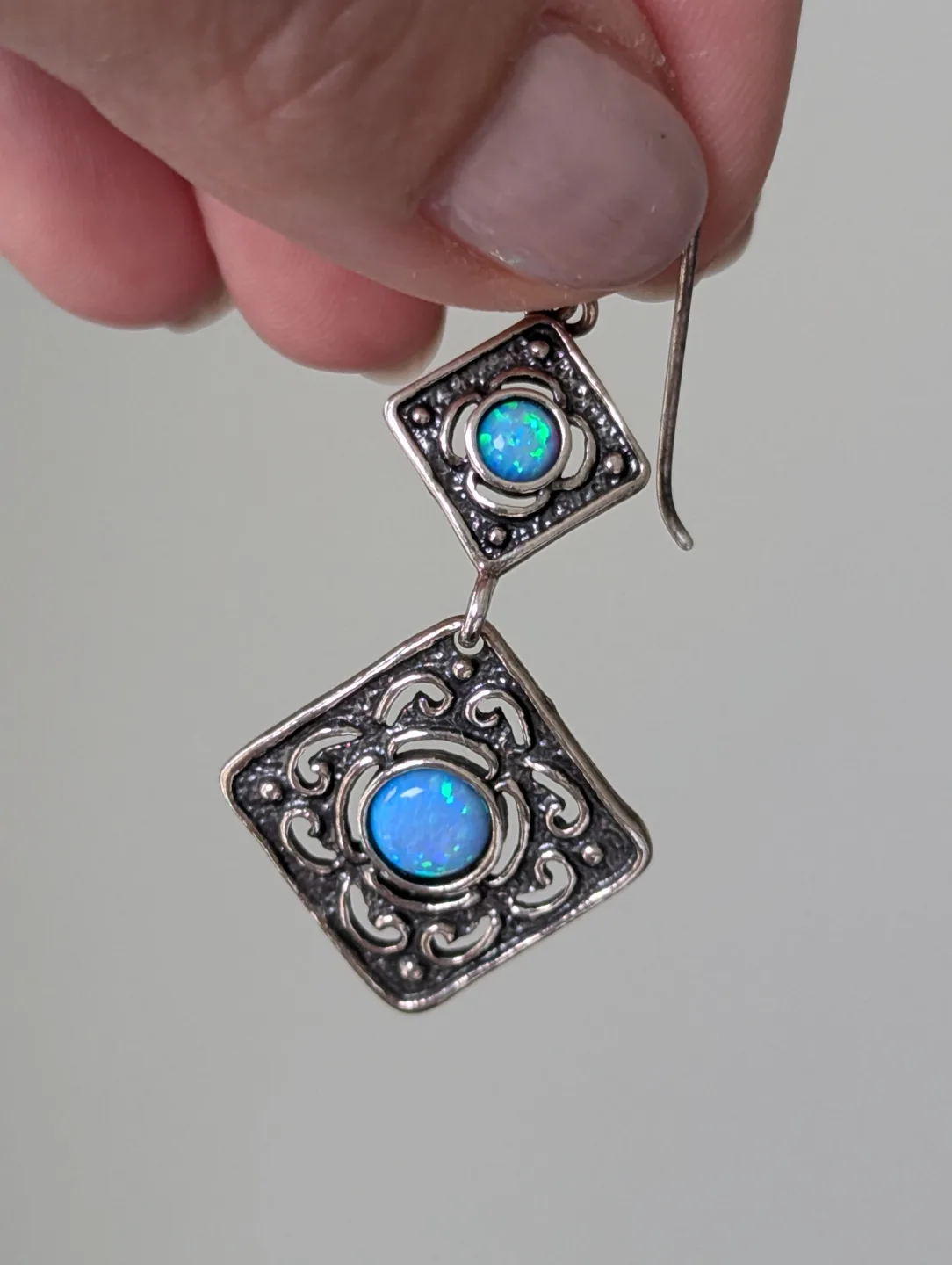 Stunning blue opals set in 925 silver dangle Earrings image indicator(2)