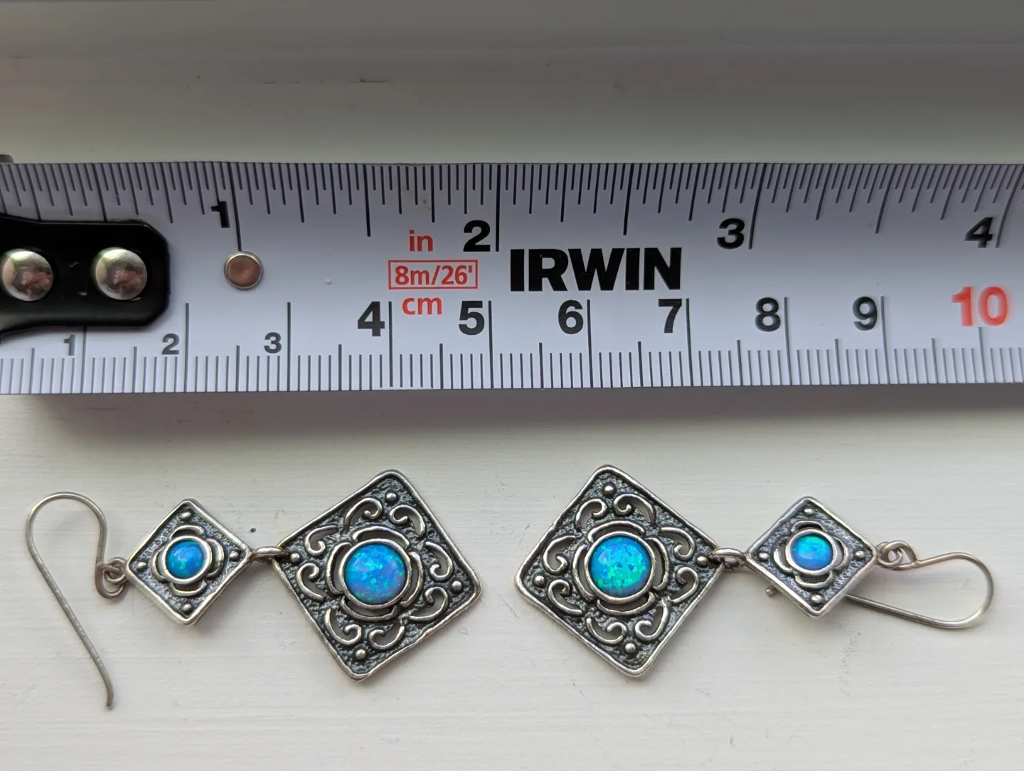 Stunning blue opals set in 925 silver dangle Earrings image indicator(3)