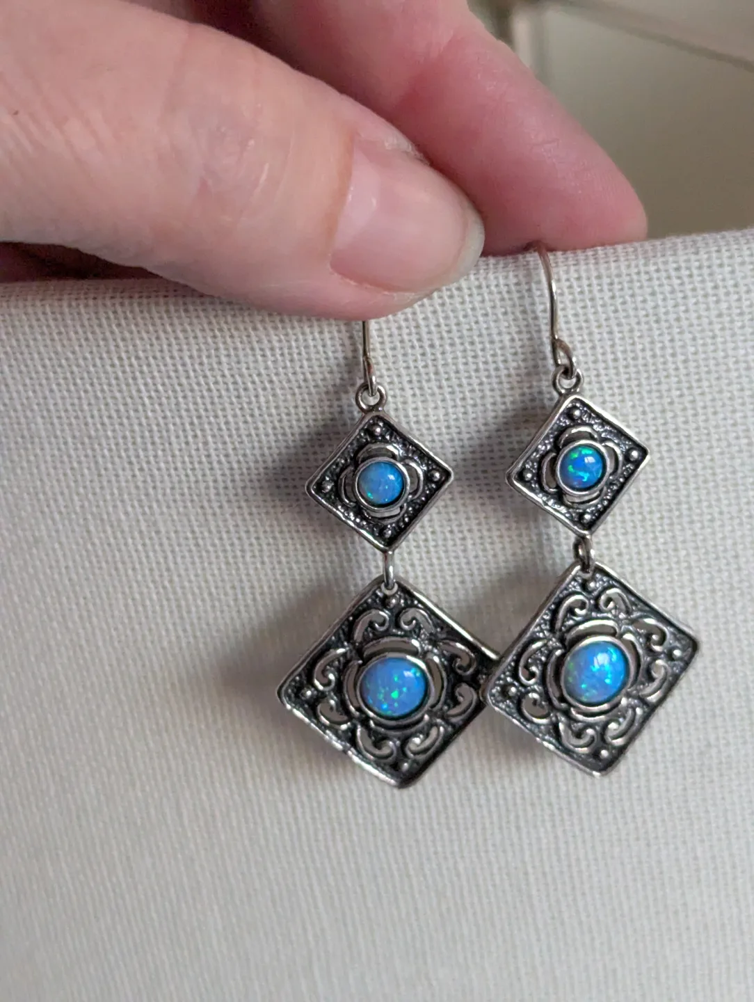 Stunning blue opals set in 925 silver dangle Earrings image indicator(4)